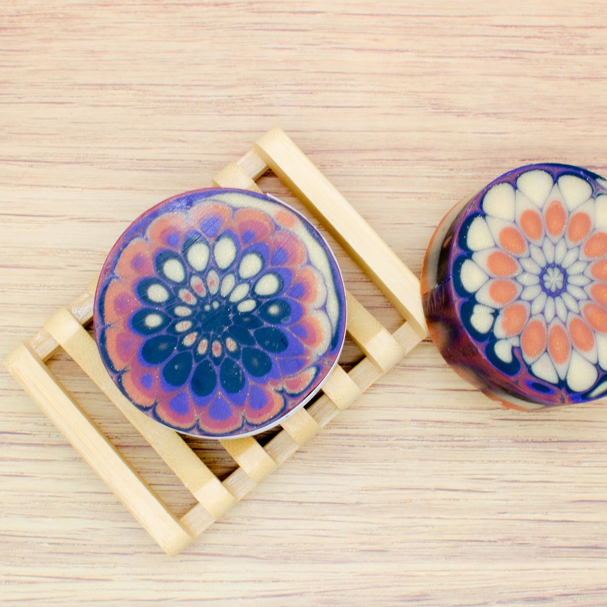 Kaleidosoap No. 29: one-of-a-kind soap in pumpkin orange, gold, purple, red, and black with gold shimmer (photo 4)