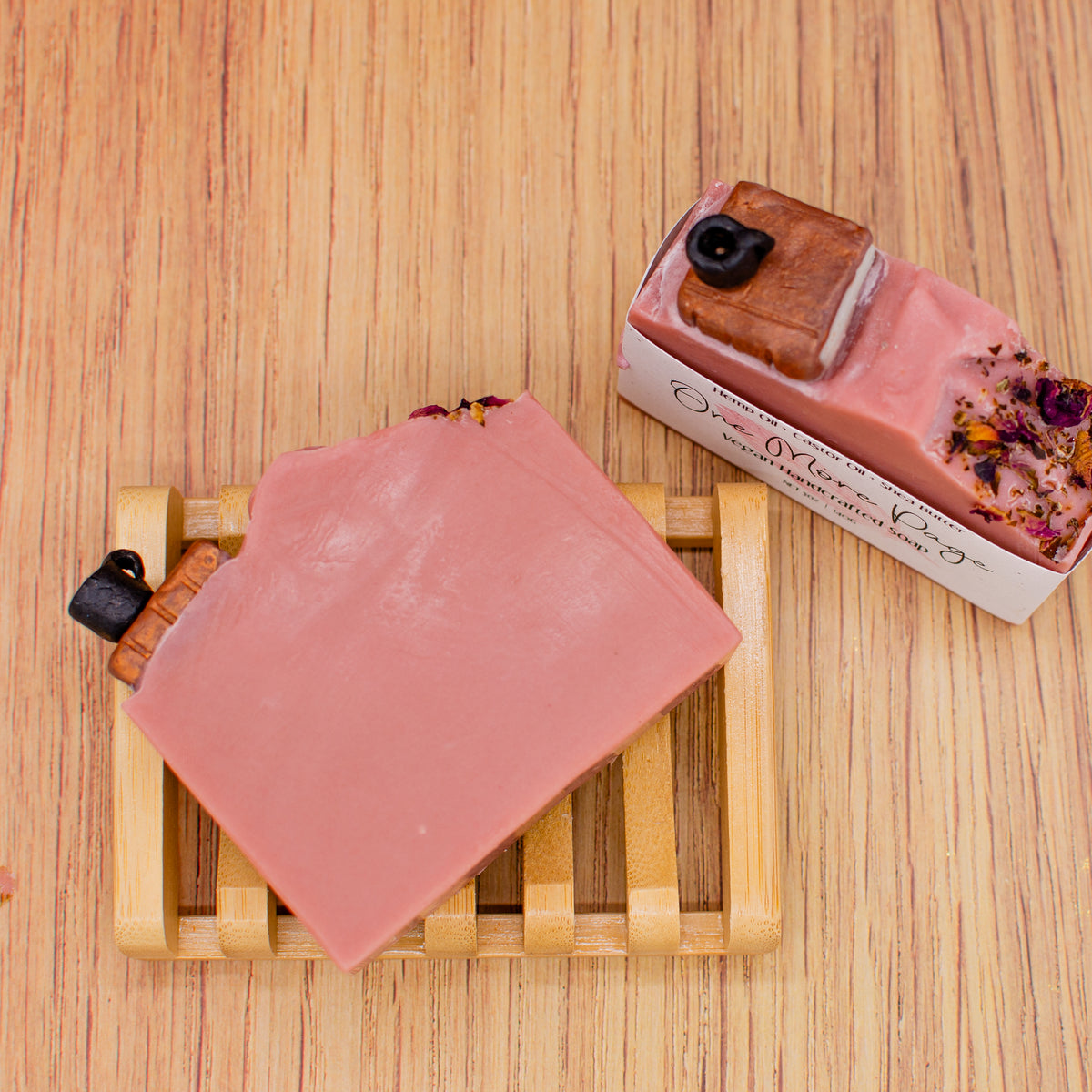One More Page Soap: coffee and leather soap bar topped with a sculpted soap book, coffee cup, and rose petals (photo 2)