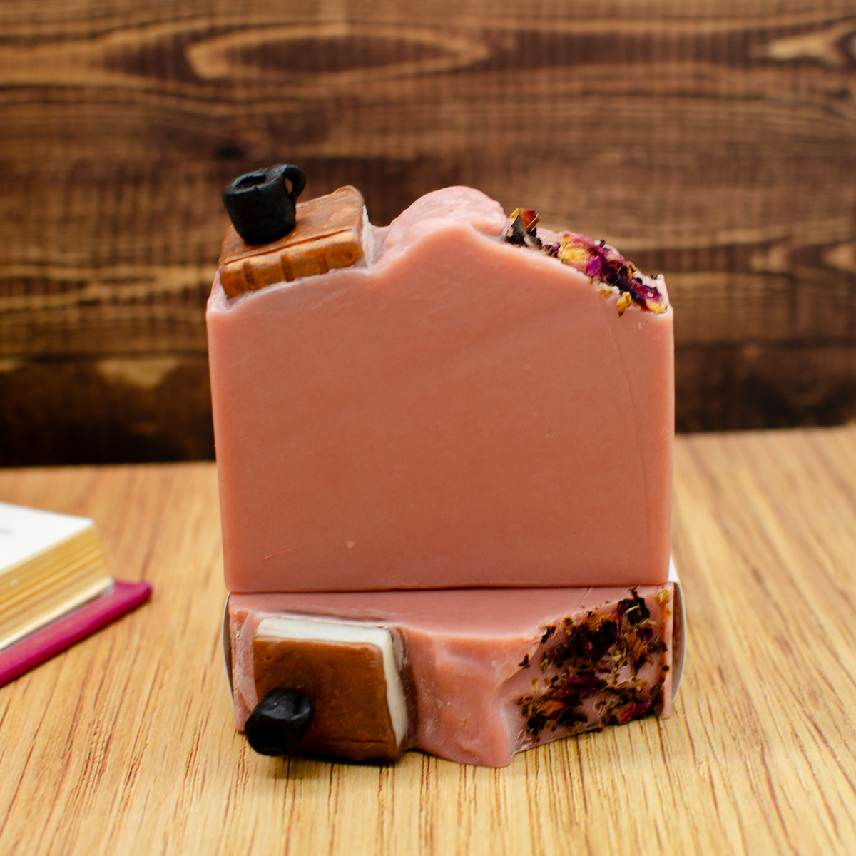 One More Page Soap: coffee and leather soap bar topped with a sculpted soap book, coffee cup, and rose petals (photo 3)