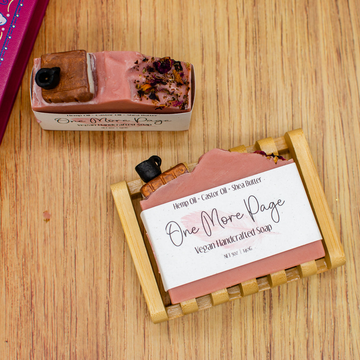 One More Page Soap: coffee and leather soap bar topped with a sculpted soap book, coffee cup, and rose petals (photo 4)